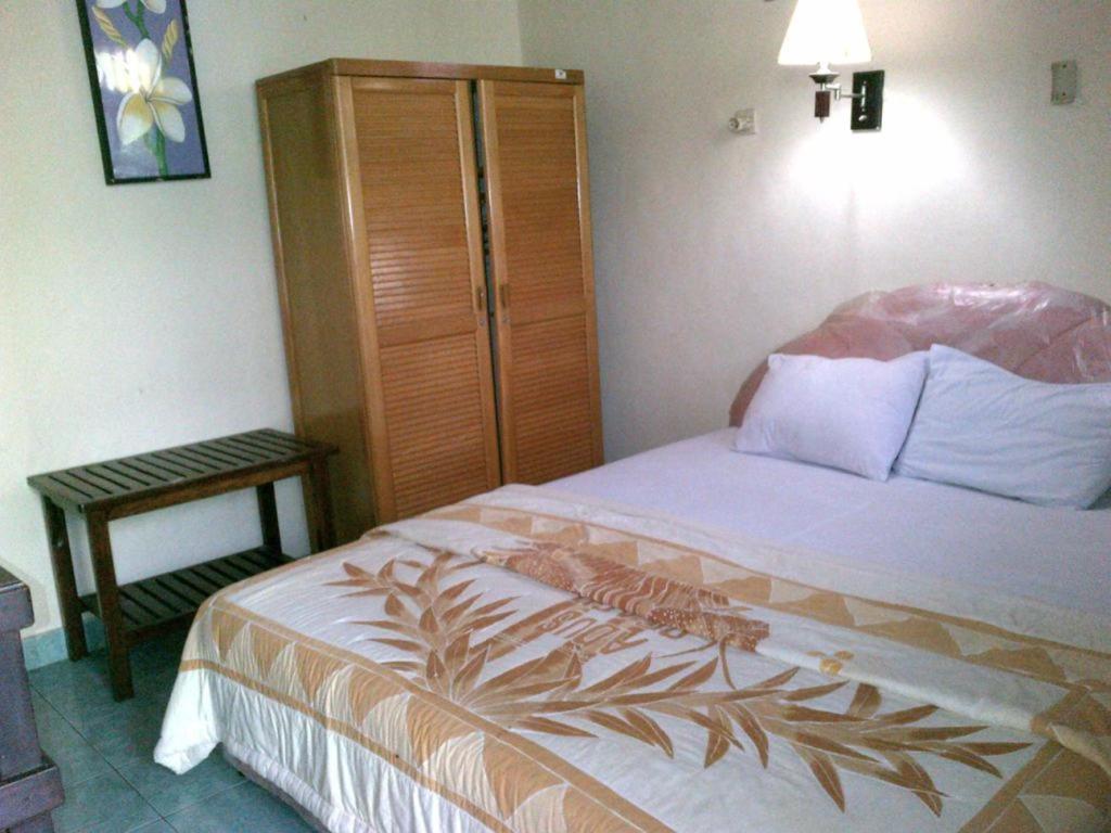 Adus Beach Inn Легиан Номер фото